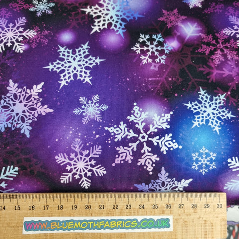 Purple Snowflakes French Terry fabric