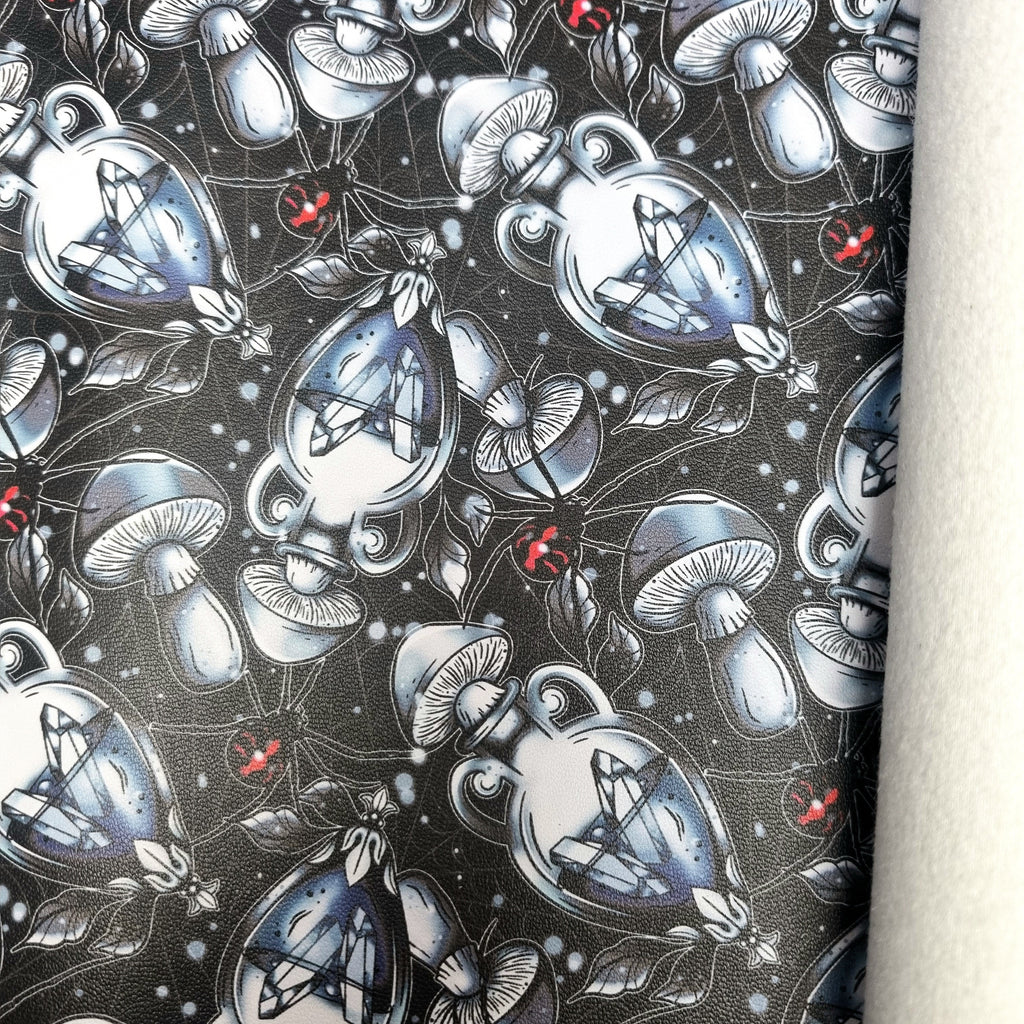 28x44cm BOLT END. Toxic Potions Faux leather / vinyl fabric