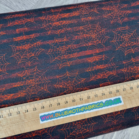 1.05m BOLT END. Grunge Stripe Spiderweb Red jersey fabric - BlueMothFabrics