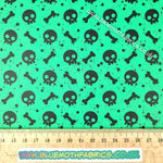 Skulls and bones green Faux leather / vinyl fabric. 40x66cm roll