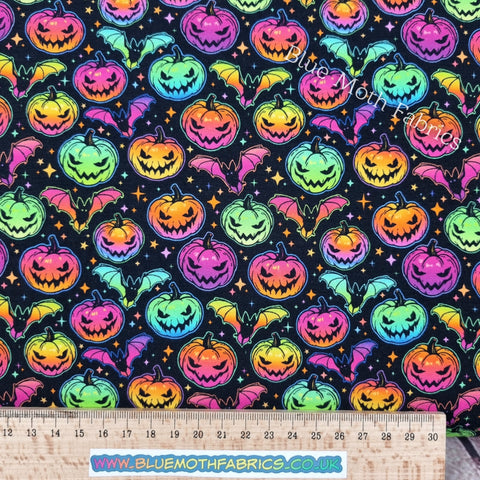 82cm BOLT END. Neon halloween pumpkins 220gsm jersey fabric