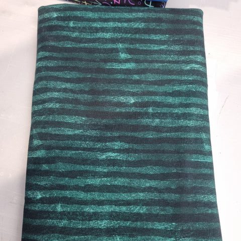 69cm BOLT END. Green grunge stripe extra heavyweigh jersey fabric
