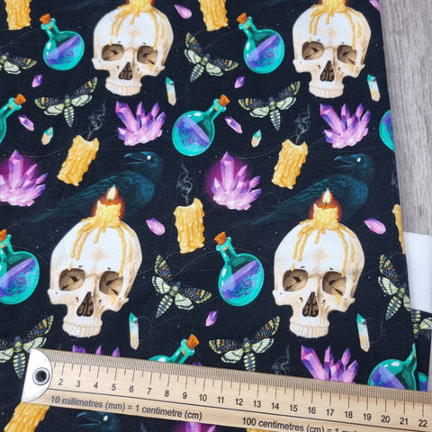 44cm BOLT END. Potion skulls 230gsm jersey fabrics