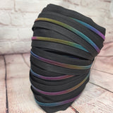 Dark semi matte rainbow zipper tape #5, sold by Meter