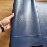 42x135cm BOLT END. NAVY. Creased marks. Solid Faux leather / vinyl fabric.