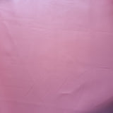 50x46cm BOLT END. Pastel Pink. Some creases.Solid Faux leather / vinyl fabric.