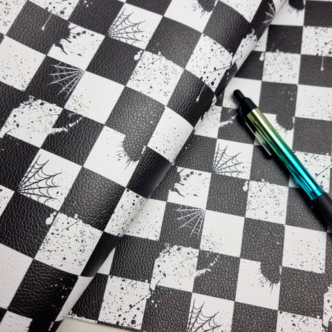 Spider Checkerboard textured Faux leather / vinyl fabric. 39x66cm roll