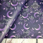Purple Moons Faux leather / vinyl fabric. 39x66cm roll