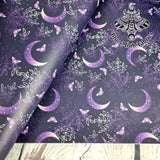 Purple Moons Faux leather / vinyl fabric. 39x66cm roll