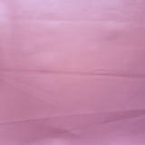 47x48cm BOLT END. Pastel Pink. Some creases.Solid Faux leather / vinyl fabric.