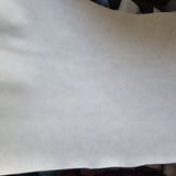 38x140cm BOLT END. Off White. Some marks Soft Marble Faux leather / vinyl fabric.