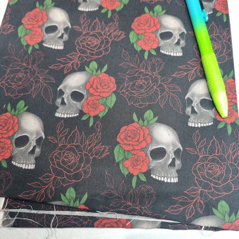 1m BOLT END. Skulls and red rosea 100% cotton poplin fabric