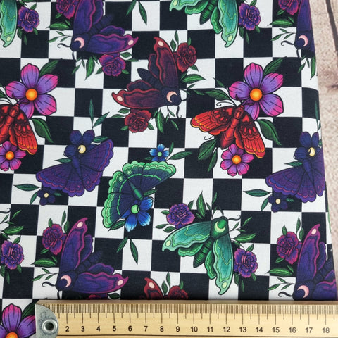 Checkerboard Moths 240gsm jersey fabric