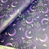 Purple Moons Faux leather / vinyl fabric. 39x66cm roll