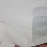 40x70cm. BOLT END.SOME MARKS.white Solid realistic texture version 2 Faux leather / vinyl fabric.