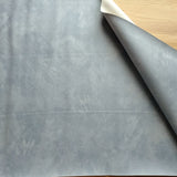 41x 71cm BOLT END. Duck egg blue. Crease lines Solid Marble Grain Faux leather / vinyl fabric.