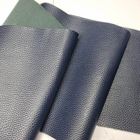 17x100cm BOLT END.  Navy Solid Textured Faux leather / vinyl fabric.