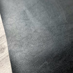 Black Solid Faux leather / vinyl fabric. 40x150cm roll. woven backing