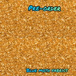 PRE-ORDER. Orange glitter effect fabric. By METER - BlueMothFabrics